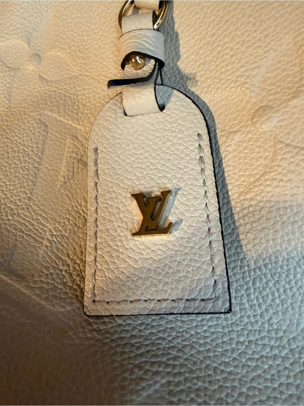 Louis Vuitton luxurious cream